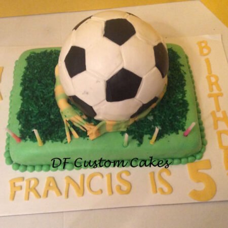 Soccer ball shaped birthday cake