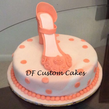 Yellow chocolate cake with ladies shoe design